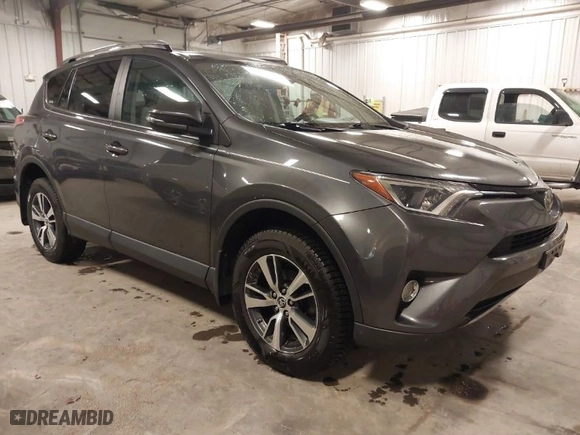 2018 Toyota RAV4 XLE with VIN 2T3RFREV4JW835563, listed as a IAAI auction lot 41431755 with 106,983 mi miles. Bid and sale history available at carsss.com. Image 1.