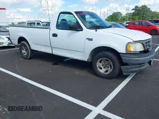 2002 Ford F-150 XL with VIN 1FTRF17282NC10211, listed as a IAAI auction lot 42241647 with 174,932 mi miles and . Bid and sale history available at DreamBid. Image 1.