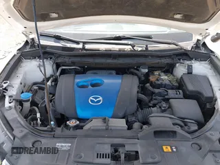 2013 Mazda CX-5 Touring with VIN JM3KE4CE1D0136241, listed as a IAAI auction lot 42119260 with 106,913 mi miles and . Bid and sale history available at carsss.com. Image 10.