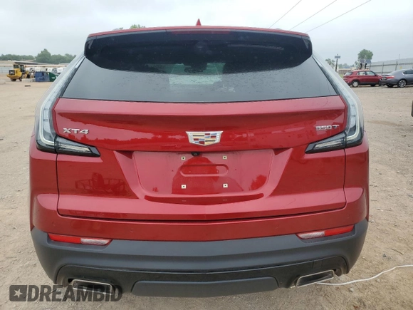 2021 Cadillac XT4 FWD Sport with VIN 1GYFZER49MF082391, listed as a Copart auction lot 56256804 with 24,415 mi miles and Salvage Title. Bid and sale history available at DreamBid. Image 6.