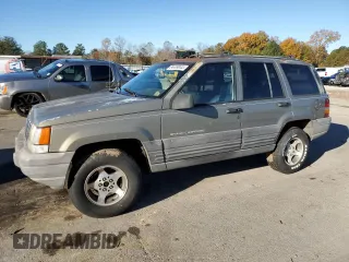 1997 Jeep Grand Cherokee TSi with VIN 1J4FX58S4VC516340, listed as a Copart auction lot 84409044 with 256,300 mi miles and Clean Title. Bid and sale history available at carsss.com. Image 1.