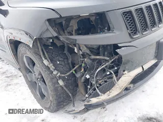 2016 Jeep Grand Cherokee Overland with VIN 1C4RJFCM5GC474718, listed as a IAAI auction lot 41307515 with 153,246 mi miles and . Bid and sale history available at DreamBid. Image 6.