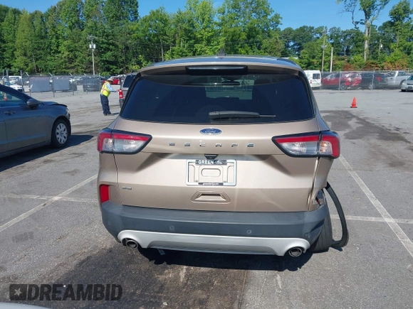 2021 Ford Escape SE with VIN 1FMCU0G67MUA00194, listed as a IAAI auction lot 42406942 with 62,553 mi miles and . Bid and sale history available at DreamBid. Image 16.