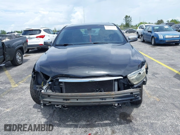 2013 Ford Taurus Limited with VIN 1FAHP2F84DG220283, listed as a IAAI auction lot 40045974 with 155,409 mi miles and . Bid and sale history available at DreamBid. Image 6.