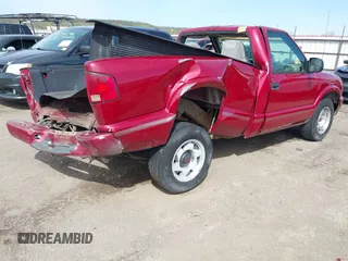 1999 GMC Sonoma with VIN 1GTCS1443X8530274, listed as a IAAI auction lot 41937187 with 210,244 mi miles. Bid and sale history available at carsss.com. Image 4.