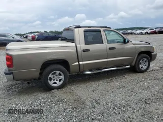 2006 Dodge Dakota SLT with VIN 1D7HE48N66S641149, listed as a Copart auction lot 58823615 with 169,002 mi miles and Salvage title. Bid and sale history available at DreamBid. Image 3.