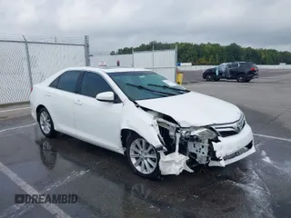 2014 Toyota Camry SE with VIN 4T1BK1FK5EU544801, listed as a IAAI auction lot 40416643 with 141,346 mi miles. Bid and sale history available at carsss.com. Image 1.