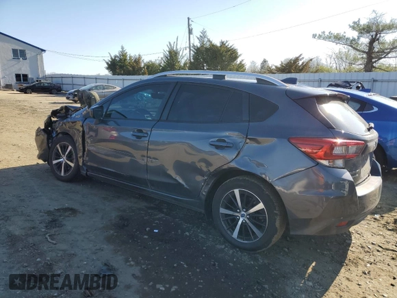 2021 Subaru Impreza Premium z VIN 4S3GTAD64M3712378, wystawiony jako Copart lot #52405735 z przebiegiem 98 077 mil mil oraz Szkoda całkowita • Salvage title. Historia ofert i sprzedaży dostępna na DreamBid. Obrazek 2.