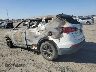 2014 Hyundai Santa Fe z VIN 5XYZTDLB0EG175658, wystawiony jako Copart lot #65454624 z przebiegiem Nie podano mil oraz Nie do naprawy. Historia ofert i sprzedaży dostępna na DreamBid. Obrazek 2.