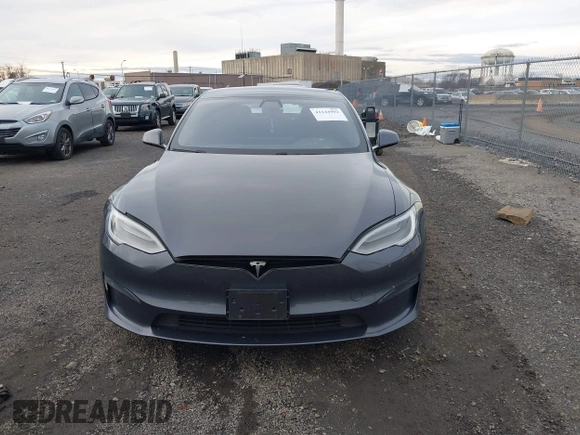 2021 Tesla Model S Long Range with VIN 5YJSA1E51MF440929, listed as a IAAI auction lot 41144902 with Not provided miles and . Bid and sale history available at DreamBid. Image 12.