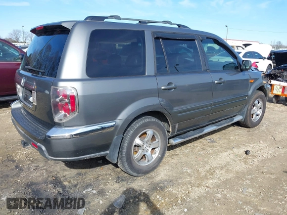 2007 Honda Pilot EX-L with VIN 5FNYF28737B001928, listed as a IAAI auction lot 41311134 with 243,870 mi miles. Bid and sale history available at carsss.com. Image 4.