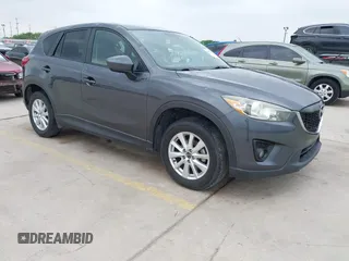 2014 Mazda CX-5 Touring z VIN JM3KE2CY9E0354539, wystawiony jako IAAI lot #41931938 z przebiegiem 151 308 mil mil oraz . Historia ofert i sprzedaży dostępna na DreamBid. Obrazek 1.