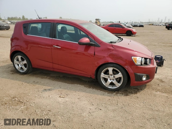 2012 Chevrolet Sonic LTZ with VIN 1G1JE6SH7C4111176, listed as a Copart auction lot 59002575 with 116,640 mi miles and Salvage title. Bid and sale history available at DreamBid. Image 4.