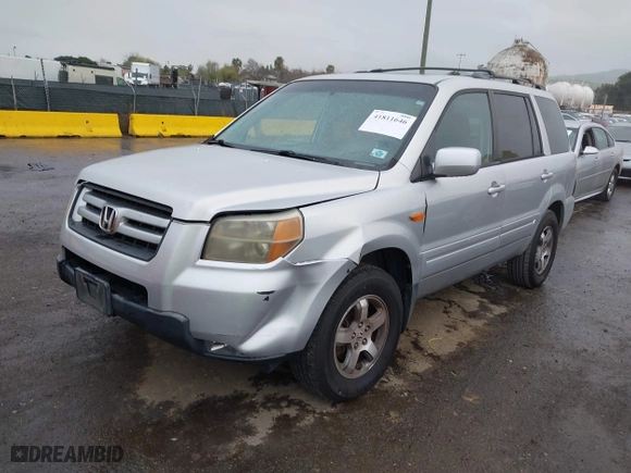 2006 Honda Pilot EX-L with RES with VIN 2HKYF18636H515182, listed as a IAAI auction lot 41811646 with 198,820 mi miles. Bid and sale history available at carsss.com. Image 2.