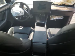 2024 Tesla Model Y с VIN 7SAYGDED1RF092027, выставлен на аукционе Copart как лот 62330775 с пробегом 22 010 миль миль и Списание • Salvage title. История ставок и продаж доступна на DreamBid. Изображение 8.