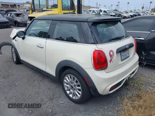 2015 MINI Hardtop S z VIN WMWXP7C55F2A39819, wystawiony jako IAAI lot #42338717 z przebiegiem 64 961 mil mil oraz . Historia ofert i sprzedaży dostępna na DreamBid. Obrazek 3.