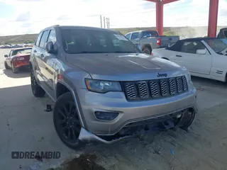 2017 Jeep Grand Cherokee Laredo with VIN 1C4RJEAG3HC826915, listed as a IAAI auction lot 40975393 with 139,236 mi miles and . Bid and sale history available at DreamBid. Image 1.