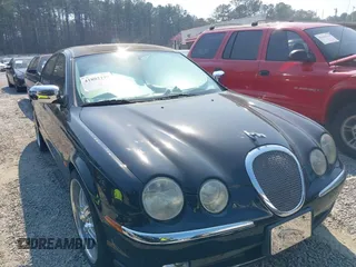 2000 Jaguar S-Type V8 with VIN SAJDA01D5YGL62099, listed as a IAAI auction lot 41802199 with 218,392 mi miles and . Bid and sale history available at DreamBid. Image 1.