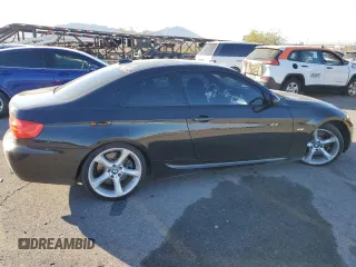 2012 BMW 3 Series 335i with VIN WBAKG7C5XCE803150, listed as a Copart auction lot 76390994 with 113,731 mi miles and Salvage Title. Bid and sale history available at carsss.com. Image 3.