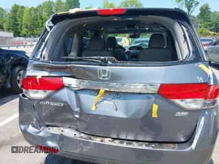 2014 Honda Odyssey EX-L with VIN 5FNRL5H63EB073585, listed as a IAAI auction lot 42673004 with 119,971 mi miles and . Bid and sale history available at DreamBid. Image 17.