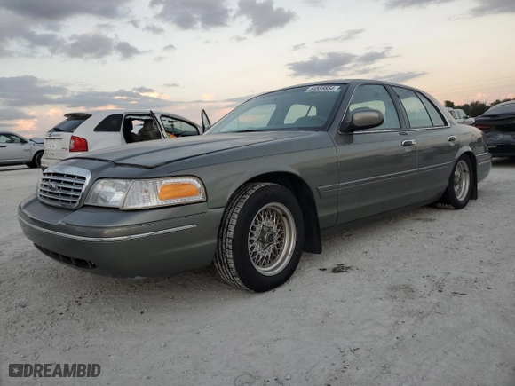 1999 Ford Crown Victoria LX with VIN 2FAFP74W7XX234277, listed as a Copart auction lot 84859854 with 0 mi miles and Clean Title. Bid and sale history available at carsss.com. Image 1.