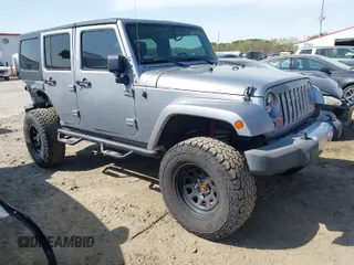 2015 Jeep Wrangler Unlimited Sahara with VIN 1C4BJWEG2FL558860, listed as a IAAI auction lot 41937360 with 113,627 mi miles. Bid and sale history available at carsss.com. Image 1.