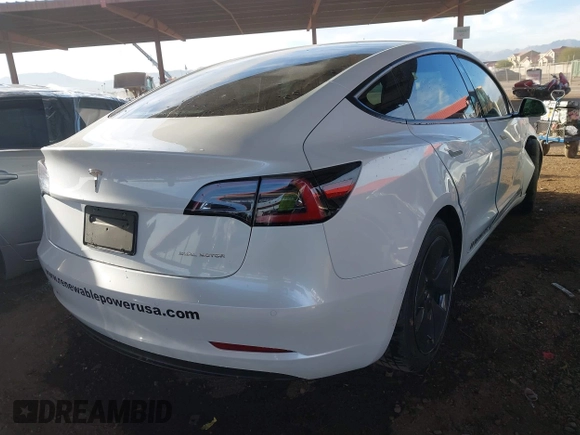 2022 Tesla Model 3 Long Range with VIN 5YJ3E1EB1NF236969, listed as a IAAI auction lot 41525117 with 24,215 mi miles and . Bid and sale history available at DreamBid. Image 4.