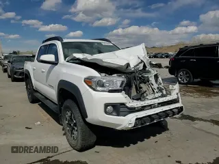 2018 Toyota Tacoma SR with VIN 5TFCZ5AN3JX128204, listed as a Copart auction lot 53970865 with 76,986 mi miles and Salvage Title. Bid and sale history available at DreamBid. Image 14.