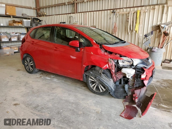 2015 Honda Fit EX-L z VIN 3HGGK5H88FM701702, wystawiony jako Copart lot #56390935 z przebiegiem 111 410 mil mil oraz Szkoda całkowita • Salvage title. Historia ofert i sprzedaży dostępna na DreamBid. Obrazek 4.