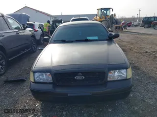 2006 Ford Police Interceptor with VIN 2FAHP71W76X142677, listed as a IAAI auction lot 41173196 with 152,236 mi miles. Bid and sale history available at carsss.com. Image 6.