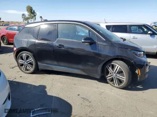 2018 BMW i3 with VIN WBY7Z2C5XJVE61932, listed as a Copart auction lot 72055694 with 0 mi miles and Salvage Title. Bid and sale history available at carsss.com. Image 4.