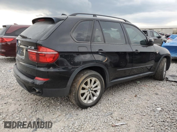 2012 BMW X5 35i with VIN 5UXZV4C59CL763577, listed as a Copart auction lot 62496155 with 148,240 mi miles and Clean title. Bid and sale history available at DreamBid. Image 3.