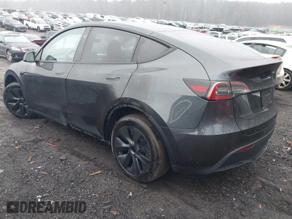 2025 Tesla Model Y Long Range with VIN 7SAYGDED0SA357488, listed as a IAAI auction lot 41550514 with 6 mi miles and . Bid and sale history available at DreamBid. Image 3.