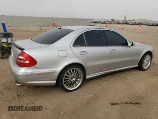 2005 Mercedes-Benz E-Class 5.5L AMG with VIN WDBUF76J05A730404, listed as a Copart auction lot 78168554 with 154,164 mi miles and Clean Title. Bid and sale history available at carsss.com. Image 3.