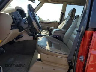 2000 Land Rover Discovery Cloth z VIN SALTY1543YA240519, wystawiony jako Copart lot #61064814 z przebiegiem 246 287 mil mil oraz Szkody całkowita. Historia ofert i sprzedaży dostępna na DreamBid. Obrazek 7.
