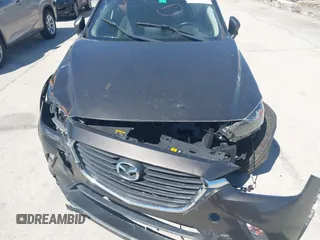 2016 Mazda CX-3 Touring with VIN JM1DKBC7XG0114940, listed as a IAAI auction lot 41777630 with 71,275 mi miles and . Bid and sale history available at DreamBid. Image 12.