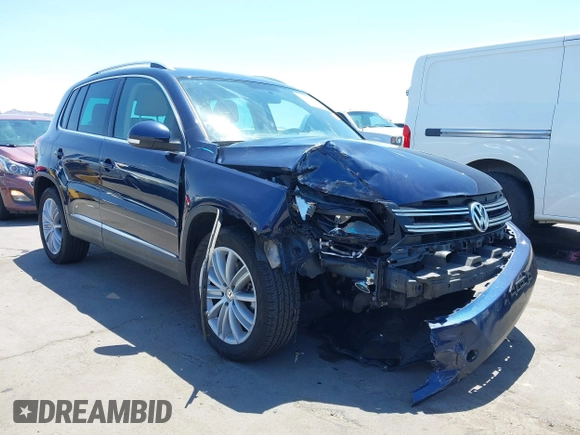 2015 Volkswagen Tiguan SE with VIN WVGAV7AX8FW595806, listed as a IAAI auction lot 42644395 with 51,638 mi miles and . Bid and sale history available at DreamBid. Image 6.