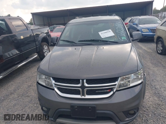 2013 Dodge Journey SXT with VIN 3C4PDCBG7DT568284, listed as a IAAI auction lot 42508928 with 215,803 mi miles and . Bid and sale history available at DreamBid. Image 12.