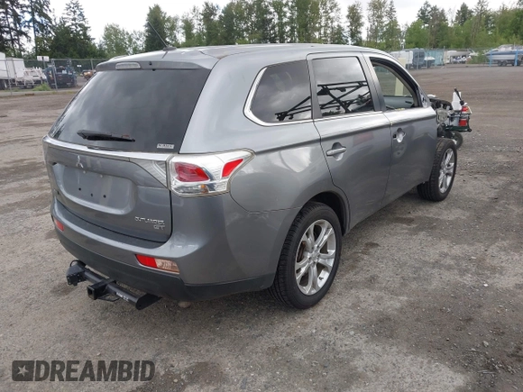 2014 Mitsubishi Outlander GT with VIN JA4JZ4AX9EZ017406, listed as a IAAI auction lot 42291696 with 107,680 mi miles and . Bid and sale history available at DreamBid. Image 4.