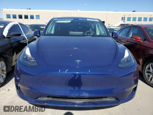 2023 Tesla Model Y Long Range with VIN 7SAYGAEE6PF689615, listed as a Copart auction lot 50999385 with 16,514 mi miles and Salvage Title. Bid and sale history available at DreamBid. Image 5.