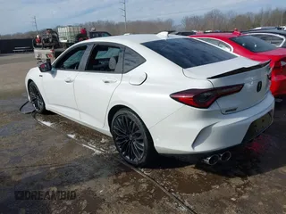 2022 Acura TLX Type S with VIN 19UUB7F00NA000479, listed as a IAAI auction lot 41564826 with 94,162 mi miles and . Bid and sale history available at DreamBid. Image 3.
