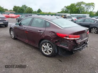 2016 Kia Optima LX with VIN 5XXGT4L31GG053429, listed as a IAAI auction lot 42464513 with 122,397 mi miles and . Bid and sale history available at DreamBid. Image 3.