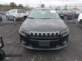 2019 Jeep Cherokee Latitude with VIN 1C4PJLCBXKD357403, listed as a IAAI auction lot 41606497 with 104,102 mi miles and . Bid and sale history available at carsss.com. Image 12.