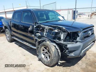 2014 Toyota Tacoma PreRunner z VIN 3TMJU4GN3EM163621, wystawiony jako IAAI lot #42007732 z przebiegiem 157 897 mil mil oraz . Historia ofert i sprzedaży dostępna na DreamBid. Obrazek 1.