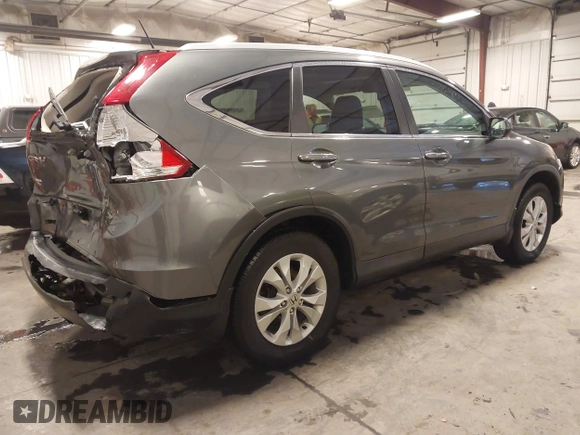 2014 Honda CR-V EX-L with VIN 5J6RM4H76EL043214, listed as a IAAI auction lot 41579664 with 124,681 mi miles. Bid and sale history available at carsss.com. Image 4.