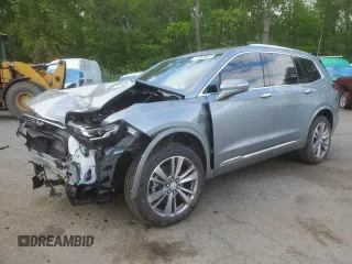2025 Cadillac XT6 AWD Premium Luxury z VIN 1GYKPDRS8SZ118323, wystawiony jako Copart lot #56156145 z przebiegiem 12 406 mil mil oraz Tytuł czysty. Historia ofert i sprzedaży dostępna na DreamBid. Obrazek 1.