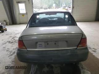 1998 Saturn SL with VIN 1G8ZF5285WZ204569, listed as a Copart auction lot 43624765 with 318,544 mi miles and Salvage Title. Bid and sale history available at carsss.com. Image 6.