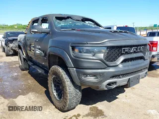 2022 Ram 1500 TRX with VIN 1C6SRFU99NN151639, listed as a IAAI auction lot 42145733 with Not provided miles and . Bid and sale history available at DreamBid. Image 1.