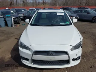 2015 Mitsubishi Lancer SE with VIN JA32V2FW9FU025402, listed as a IAAI auction lot 41646407 with 67,201 mi miles. Bid and sale history available at carsss.com. Image 12.