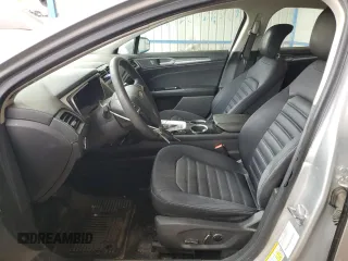 2013 Ford Fusion SE Hybrid z VIN 3FA6P0LU2DR104182, wystawiony jako Copart lot #63107545 z przebiegiem 249 317 mil mil oraz Szkoda całkowita • Salvage title. Historia ofert i sprzedaży dostępna na DreamBid. Obrazek 7.